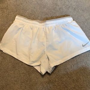 White Nike shorts